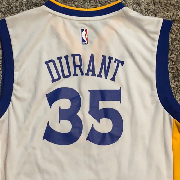 A kevin Durant warriors jersey size is large. - Picture 3 of 4